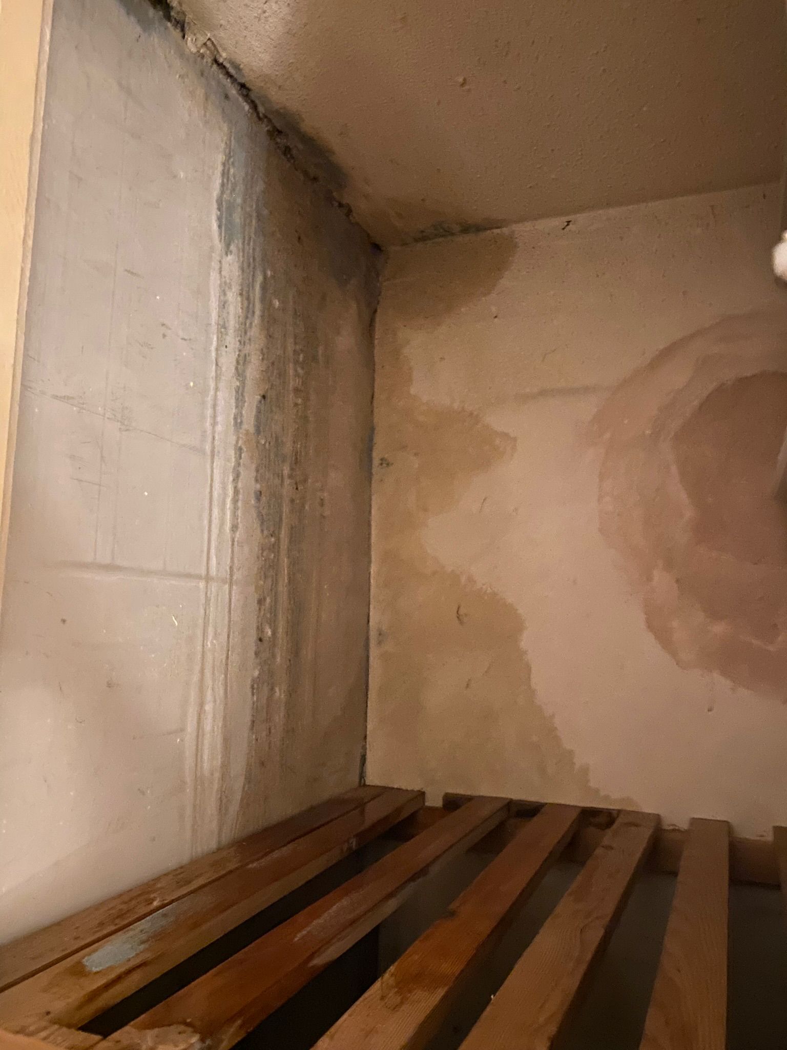 severe water damaged cupboard